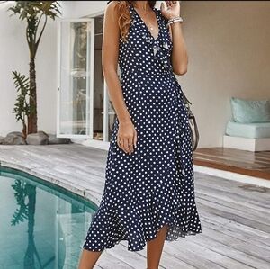 NEW w/o tags Small navy w/white polka dots dress w/gentle ruffle edge detailing